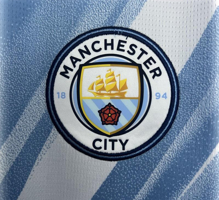 fodboldtrøje Manchester City himmelblå med klubmærke hjemmebanetrøje