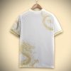 maillot-supporter-real-madrid-concept-premium-avec-motif-dragon-dore-edition-limitee supportertrøje Real Madrid concept premium med gyldent dragemønster limited edition