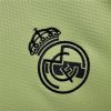 MAILLOTREALMADRID2425gardienvertlogo.jpg Real Madrid Målmandstrøje Grøn 2024-2025 stofdetalje