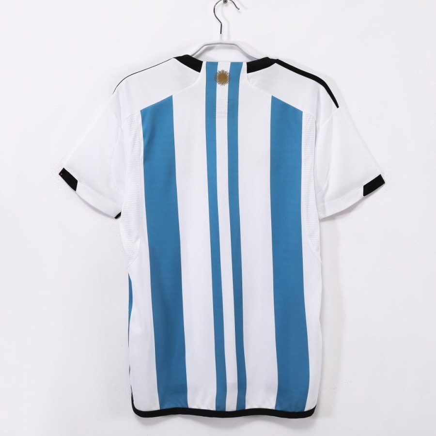 775fda5c10e4757b7a1dbc29c619f15f_f677f71d-f296-40a0-898f-8d0981b32f34.jpg Argentine Hjemmebanetrøje 2022 Retro